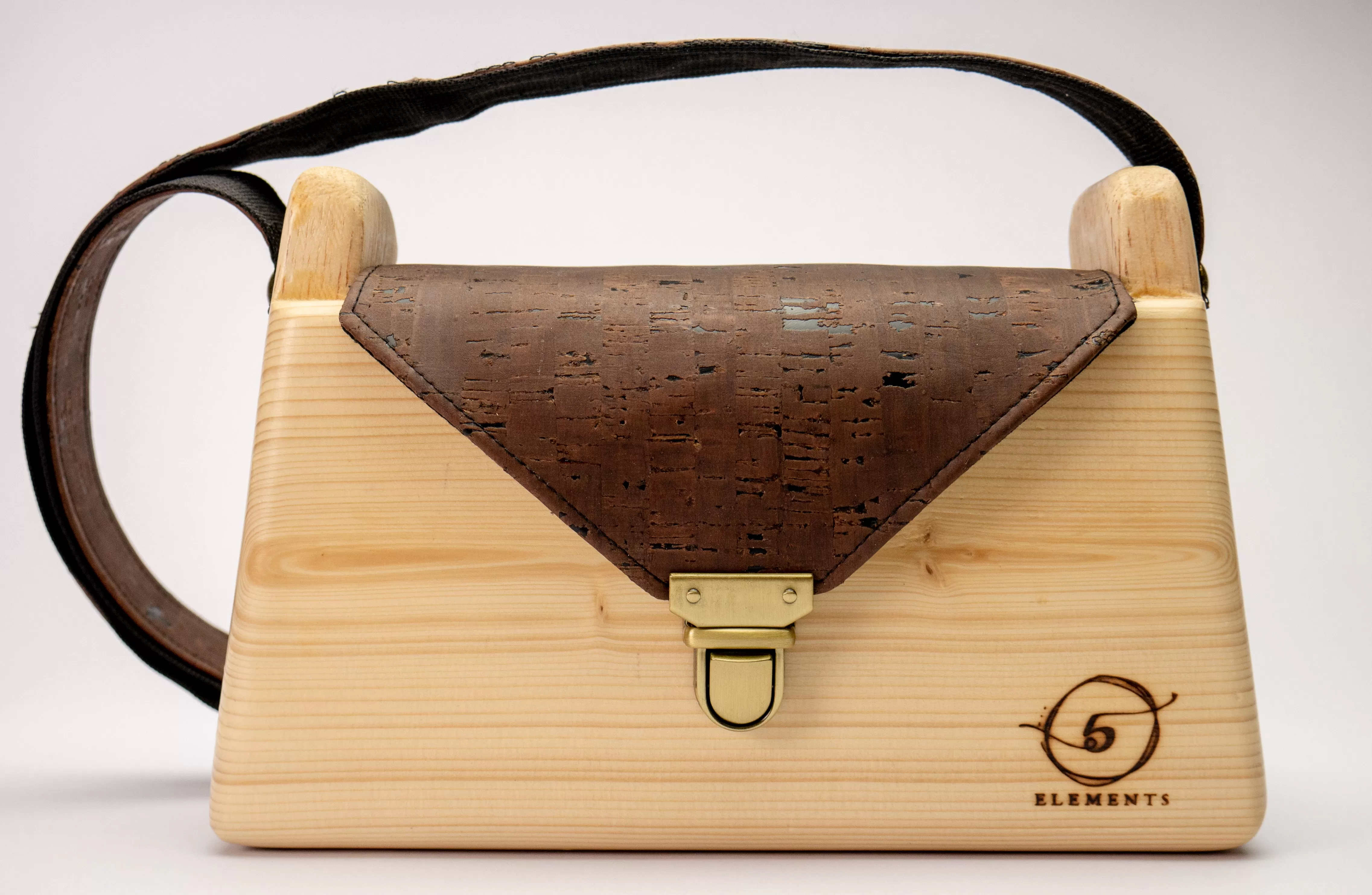 Wooden handmade shoulder bag with dark brown cork leather.